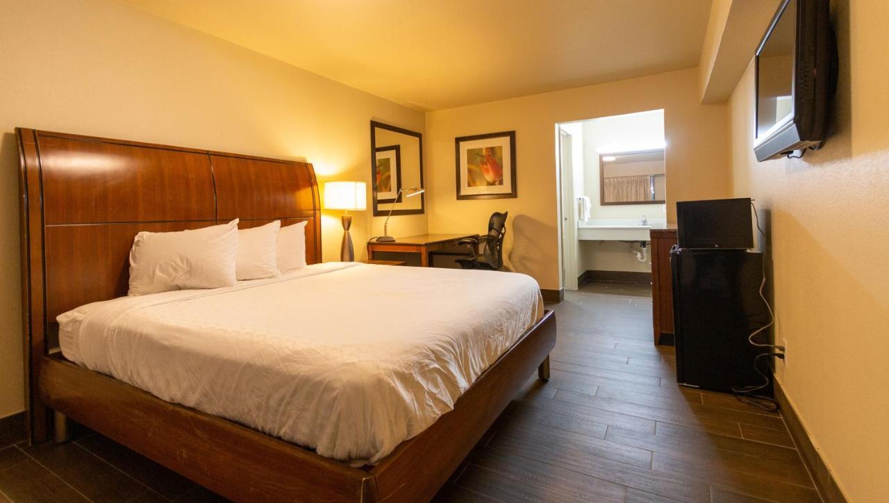 Magnuson Extended Stay And Suites Airport Hotel Ирвинг Экстерьер фото